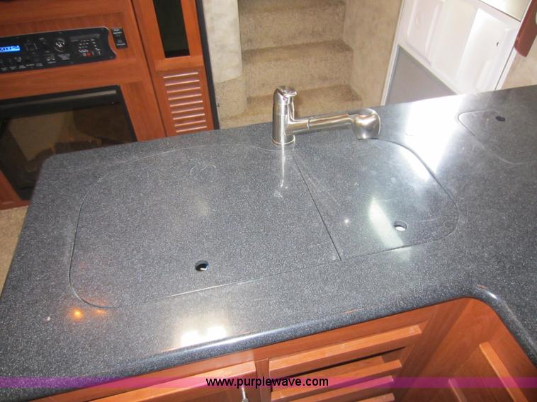 image for item C5426 2011 Keystone Fuzion toy hauler travel trailer