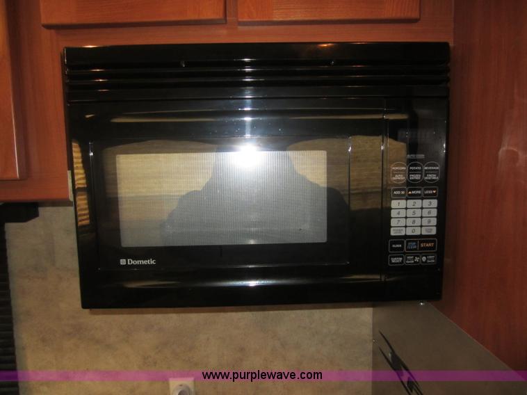 image for item C5426 2011 Keystone Fuzion toy hauler travel trailer