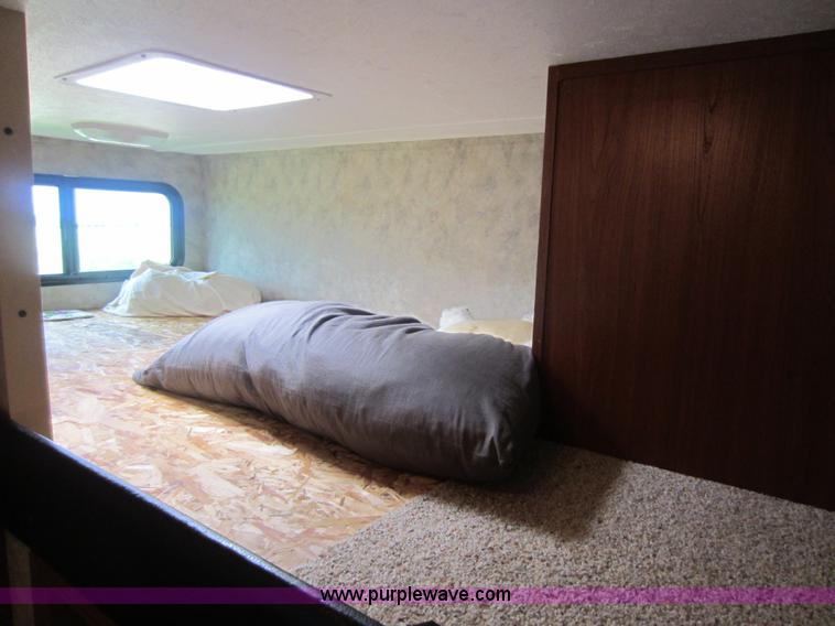 image for item C5426 2011 Keystone Fuzion toy hauler travel trailer