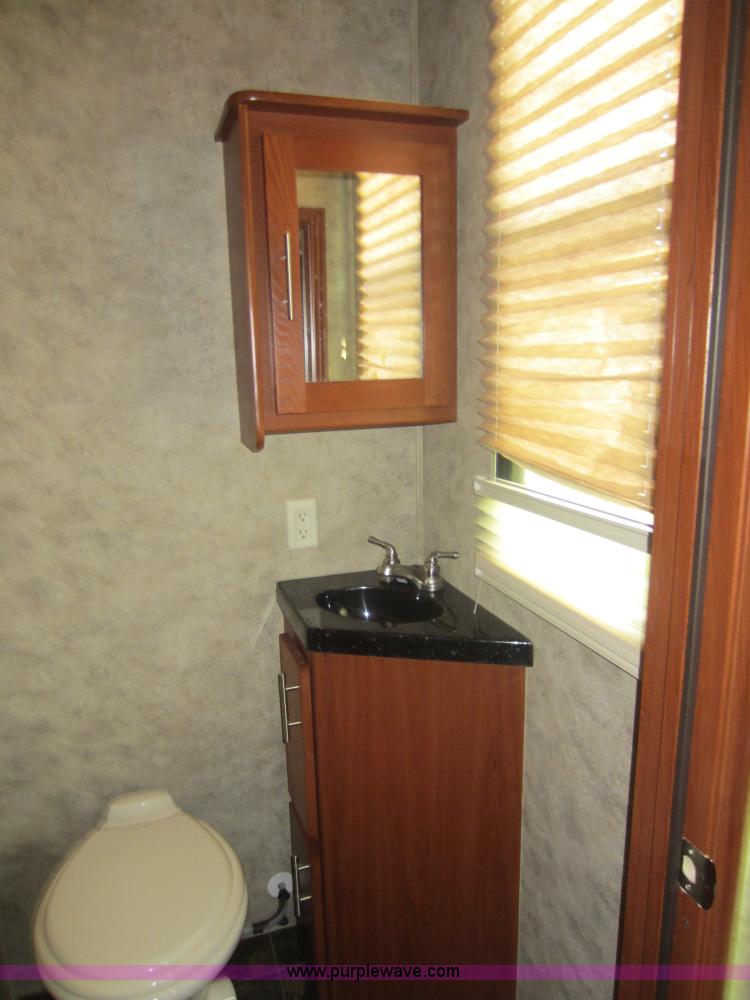 image for item C5426 2011 Keystone Fuzion toy hauler travel trailer