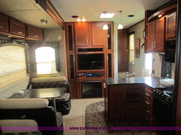 image for item C5426 2011 Keystone Fuzion toy hauler travel trailer