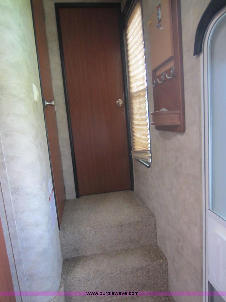 image for item C5426 2011 Keystone Fuzion toy hauler travel trailer