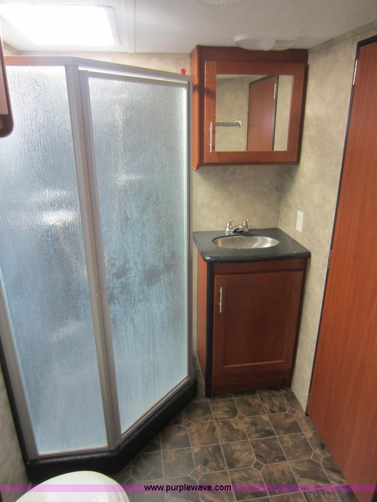 image for item C5426 2011 Keystone Fuzion toy hauler travel trailer