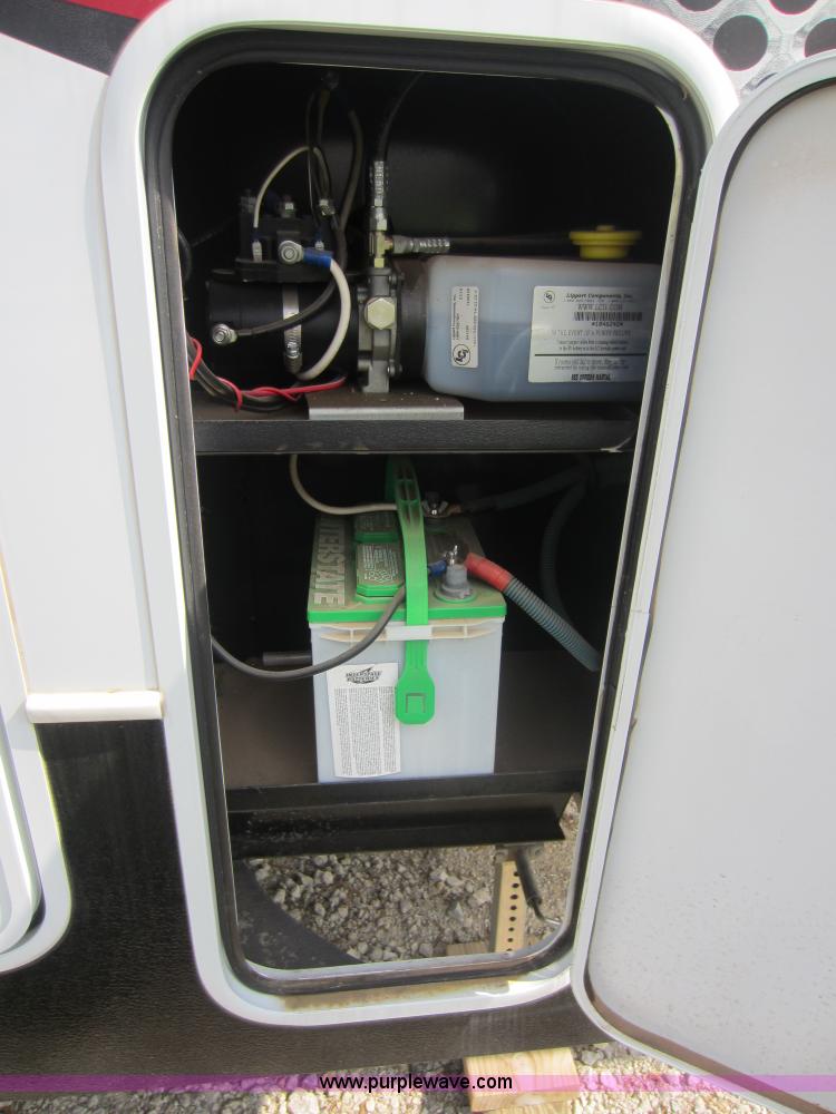 image for item C5426 2011 Keystone Fuzion toy hauler travel trailer