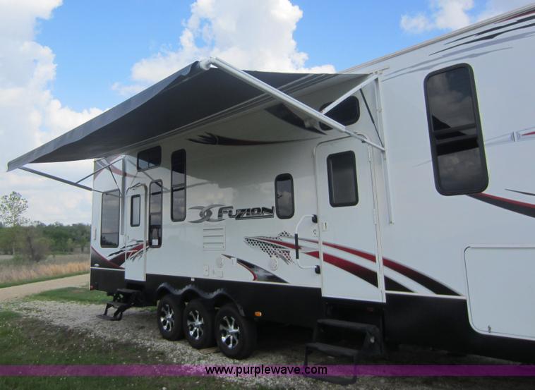 image for item C5426 2011 Keystone Fuzion toy hauler travel trailer