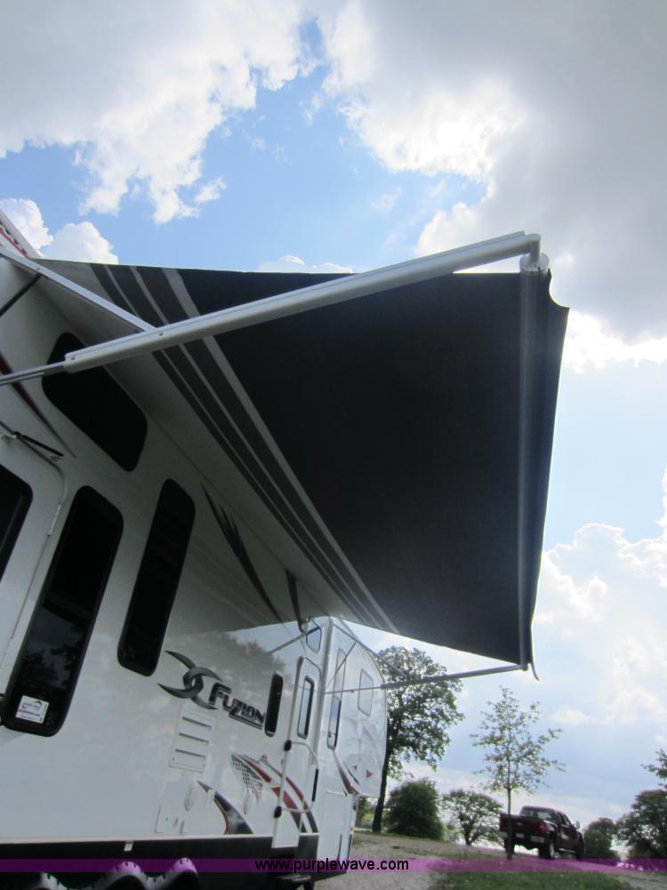 image for item C5426 2011 Keystone Fuzion toy hauler travel trailer