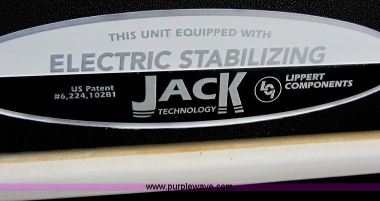 image for item C5426 2011 Keystone Fuzion toy hauler travel trailer