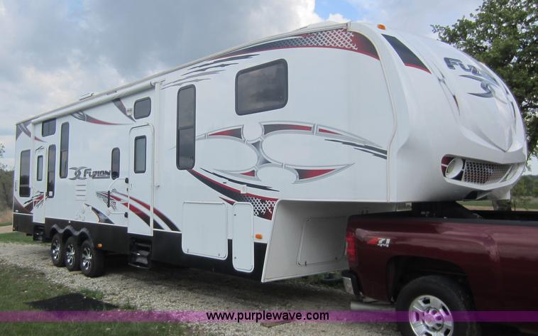 image for item C5426 2011 Keystone Fuzion toy hauler travel trailer