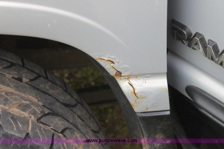 image for item D7677 1998 Dodge Ram 1500 SLT quad cab pickup truck