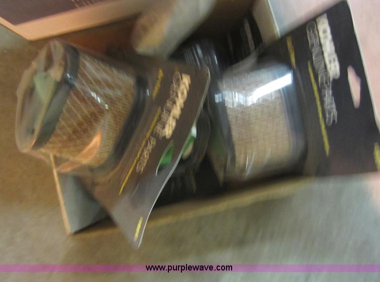 image for item V9033 Assorted air filters, Oregon chainsaw bars, mower blades, and other parts