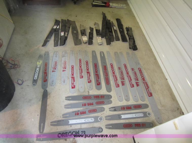 image for item V9033 Assorted air filters, Oregon chainsaw bars, mower blades, and other parts