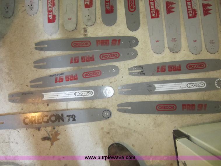 image for item V9033 Assorted air filters, Oregon chainsaw bars, mower blades, and other parts