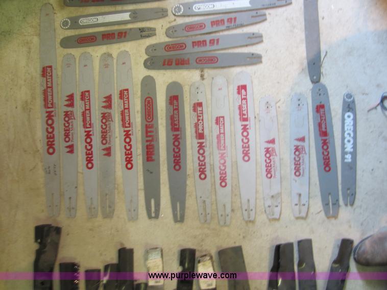image for item V9033 Assorted air filters, Oregon chainsaw bars, mower blades, and other parts
