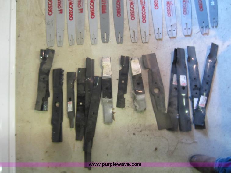 image for item V9033 Assorted air filters, Oregon chainsaw bars, mower blades, and other parts