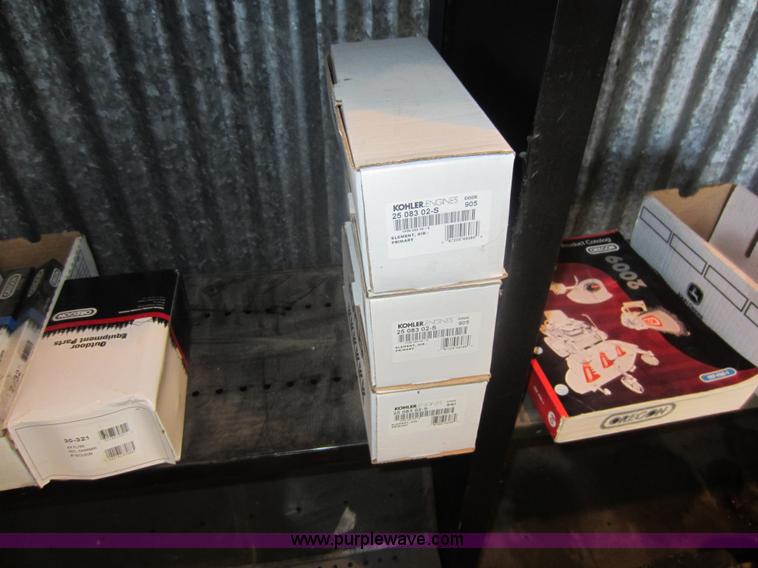 image for item V9033 Assorted air filters, Oregon chainsaw bars, mower blades, and other parts