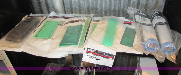image for item V9033 Assorted air filters, Oregon chainsaw bars, mower blades, and other parts