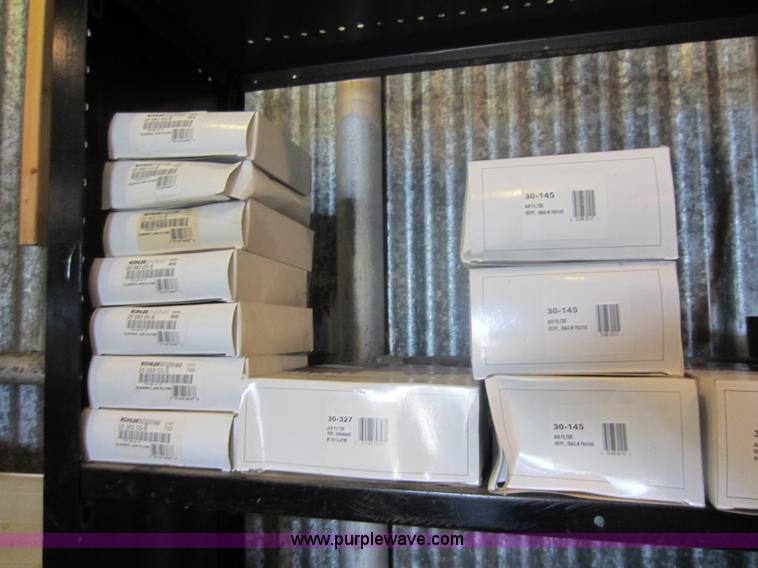 image for item V9033 Assorted air filters, Oregon chainsaw bars, mower blades, and other parts