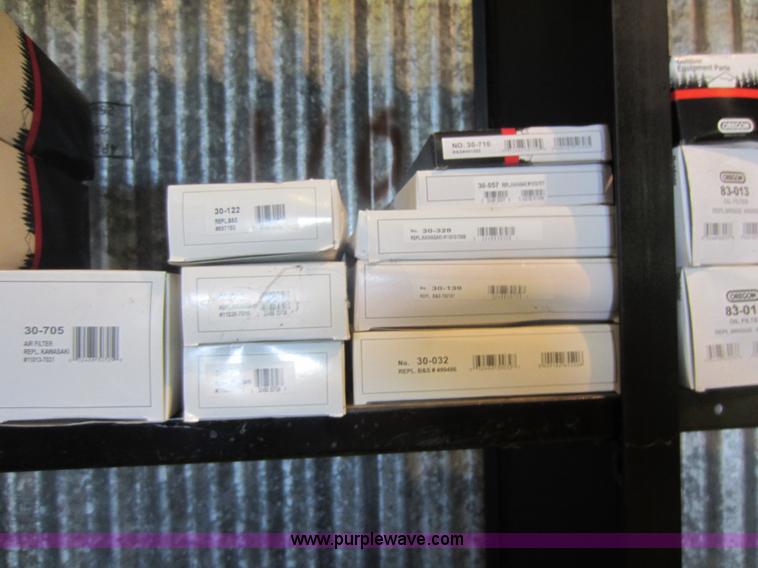 image for item V9033 Assorted air filters, Oregon chainsaw bars, mower blades, and other parts
