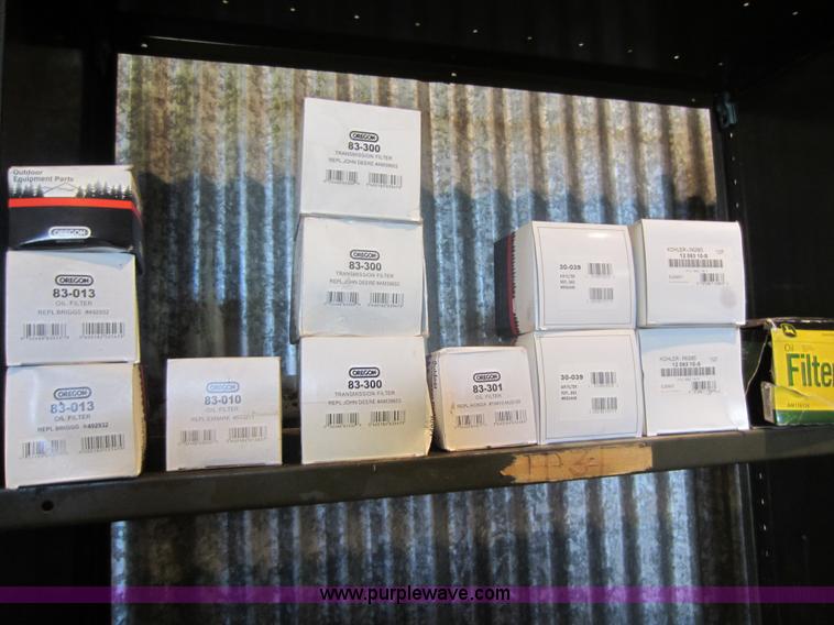 image for item V9033 Assorted air filters, Oregon chainsaw bars, mower blades, and other parts