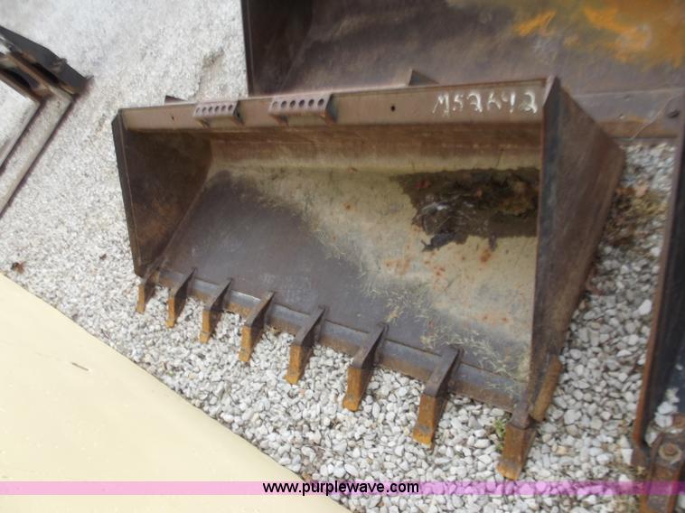 image for item D3819 71"W skid steer bucket