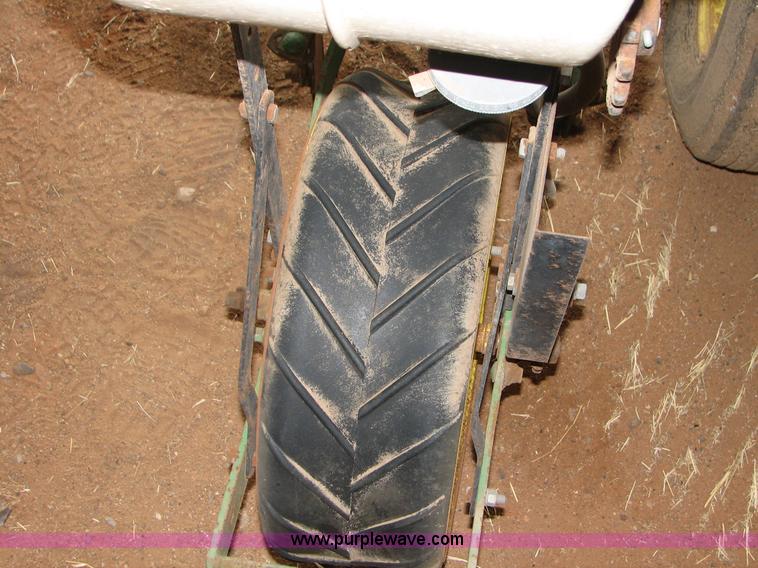 image for item B1184 John Deere 1240 four row planter