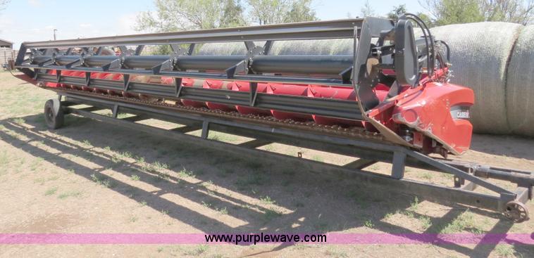 image for item B2274 2010 Case IH 2020 30' rigid platform header with trailer