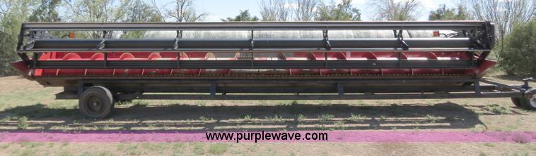 image for item B2274 2010 Case IH 2020 30' rigid platform header with trailer