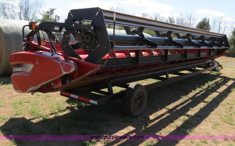 image for item B2274 2010 Case IH 2020 30' rigid platform header with trailer