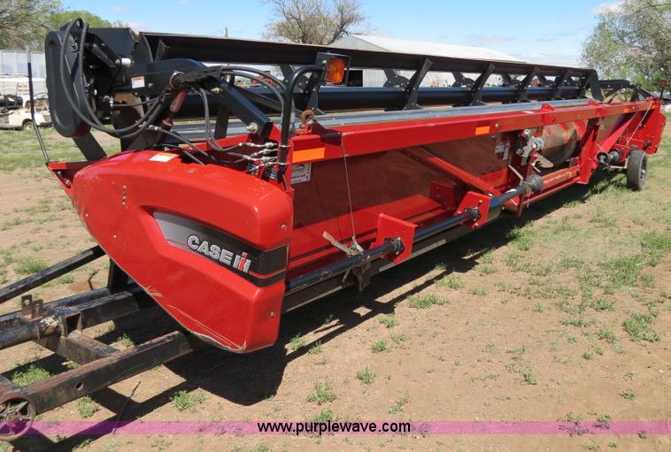 image for item B2274 2010 Case IH 2020 30' rigid platform header with trailer