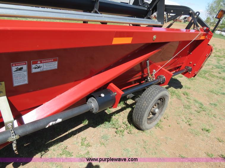 image for item B2274 2010 Case IH 2020 30' rigid platform header with trailer