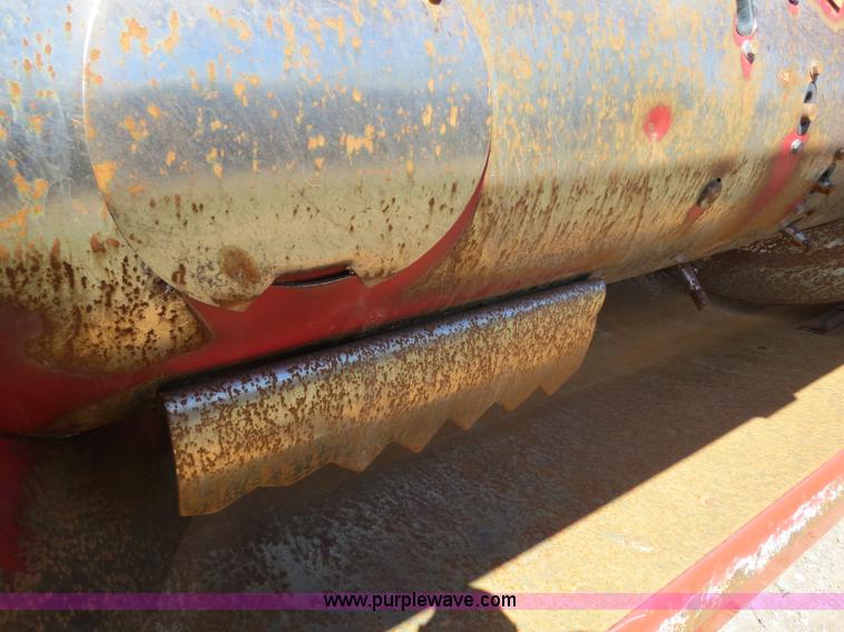 image for item B2274 2010 Case IH 2020 30' rigid platform header with trailer