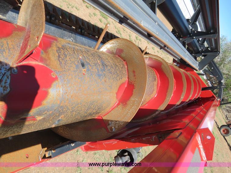 image for item B2274 2010 Case IH 2020 30' rigid platform header with trailer