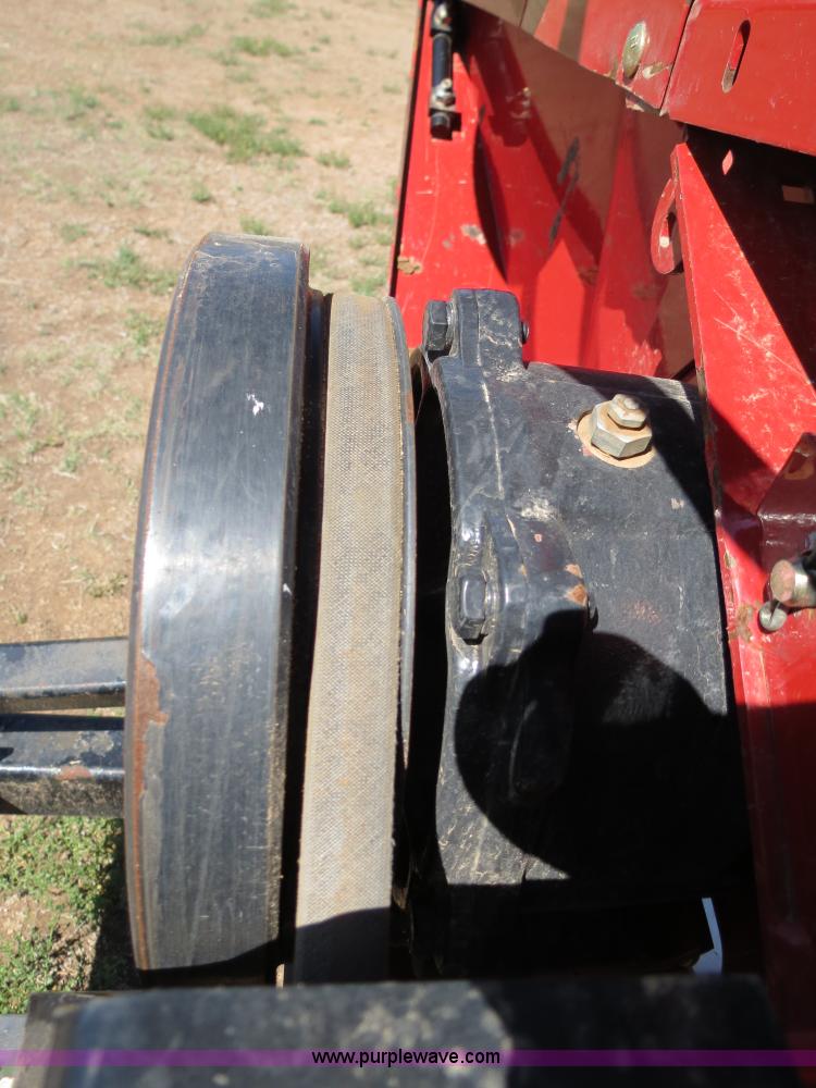 image for item B2274 2010 Case IH 2020 30' rigid platform header with trailer