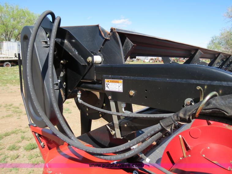 image for item B2274 2010 Case IH 2020 30' rigid platform header with trailer