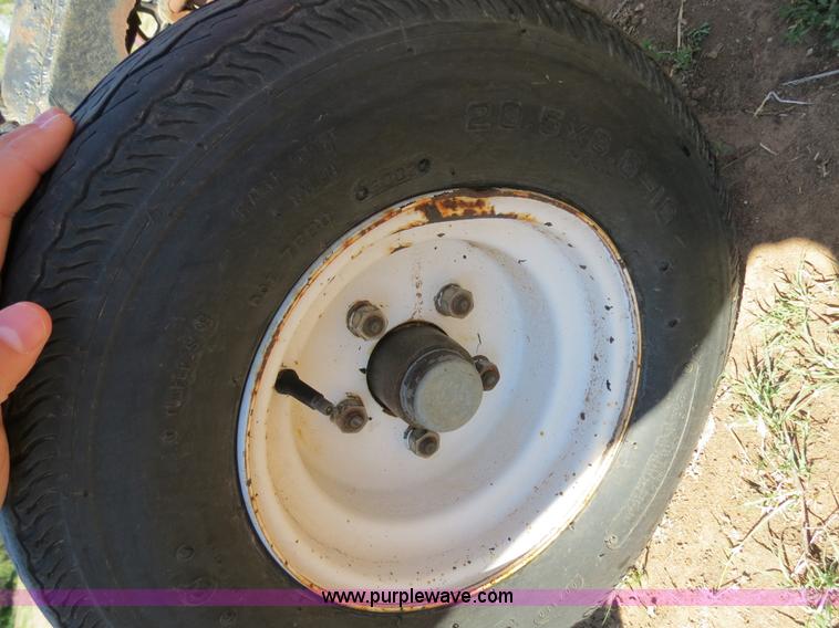 image for item B2274 2010 Case IH 2020 30' rigid platform header with trailer