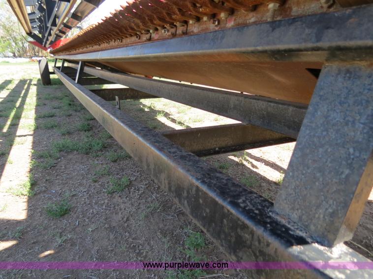 image for item B2274 2010 Case IH 2020 30' rigid platform header with trailer