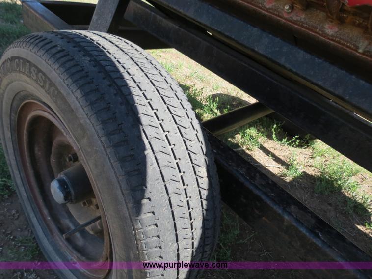 image for item B2274 2010 Case IH 2020 30' rigid platform header with trailer