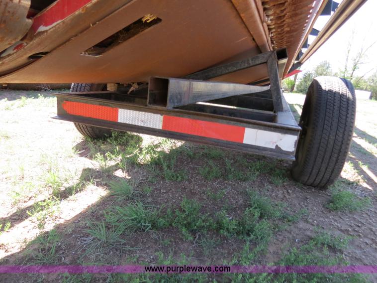 image for item B2274 2010 Case IH 2020 30' rigid platform header with trailer