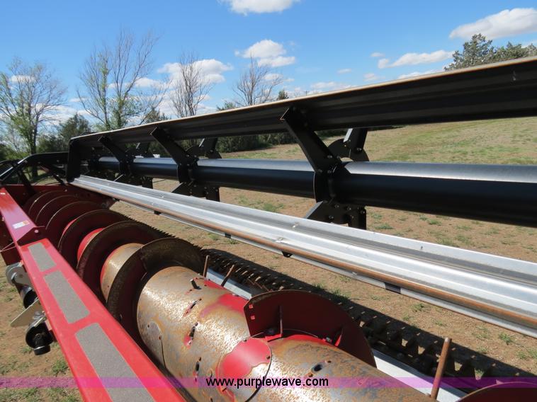 image for item B2274 2010 Case IH 2020 30' rigid platform header with trailer