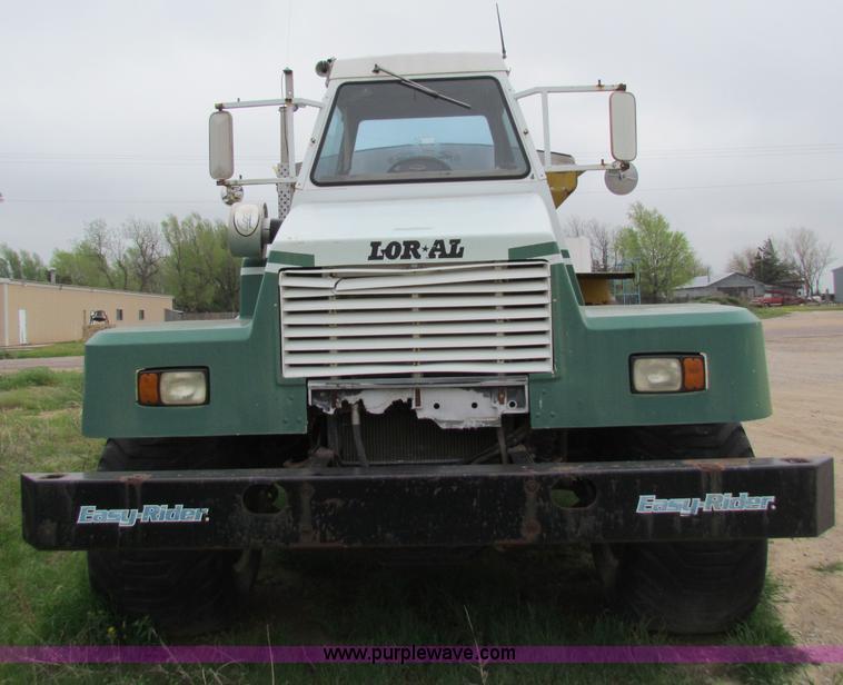 image for item B7211 Loral Magnum III center cab spreader truck