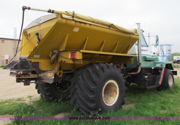 image for item B7211 Loral Magnum III center cab spreader truck