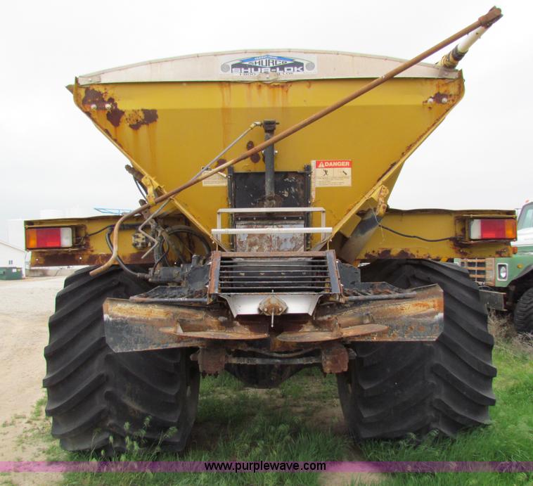 image for item B7211 Loral Magnum III center cab spreader truck