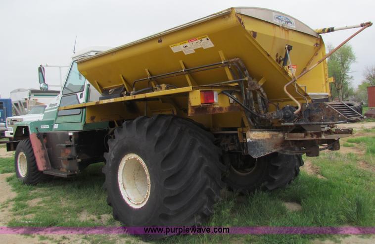 image for item B7211 Loral Magnum III center cab spreader truck