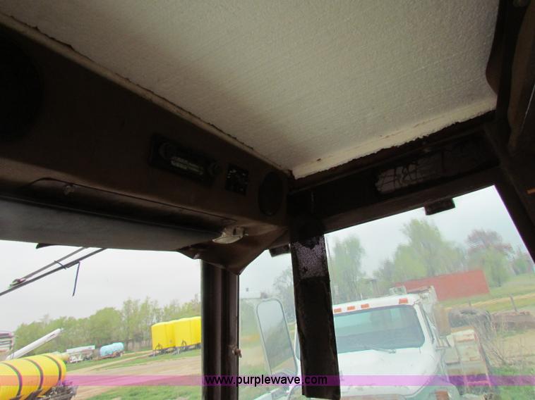 image for item B7211 Loral Magnum III center cab spreader truck