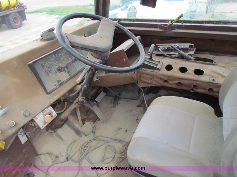 image for item B7211 Loral Magnum III center cab spreader truck