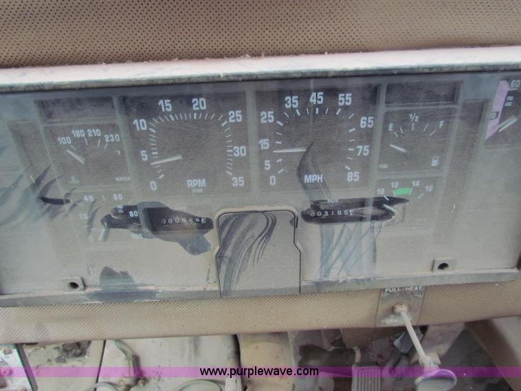 image for item B7211 Loral Magnum III center cab spreader truck