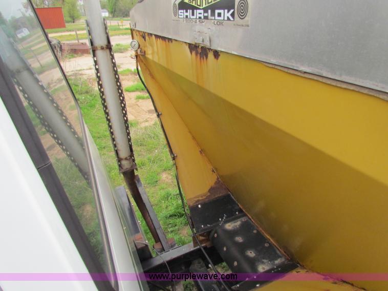 image for item B7211 Loral Magnum III center cab spreader truck