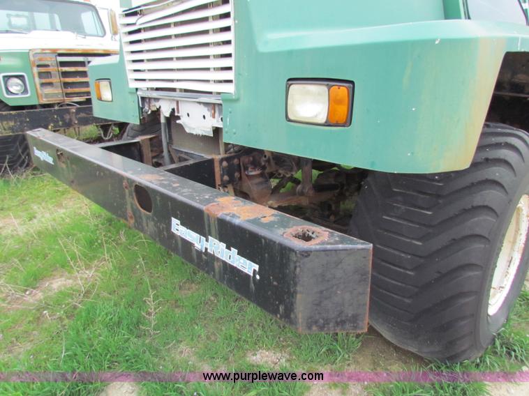 image for item B7211 Loral Magnum III center cab spreader truck