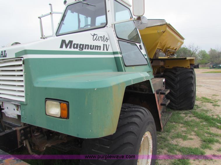 image for item B7211 Loral Magnum III center cab spreader truck