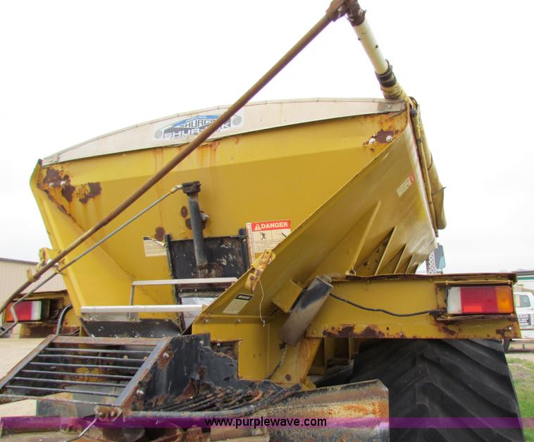 image for item B7211 Loral Magnum III center cab spreader truck